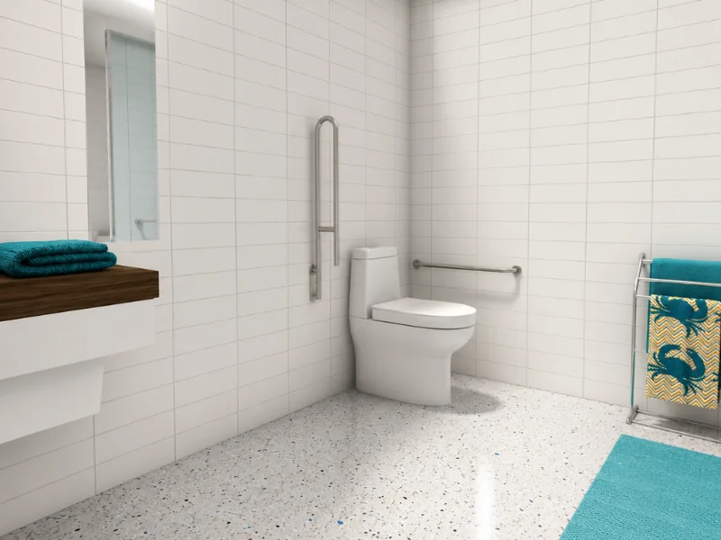 Accessible bathroom with a raised toilet, wall-mounted grab bars, open floor space, and teal accents.