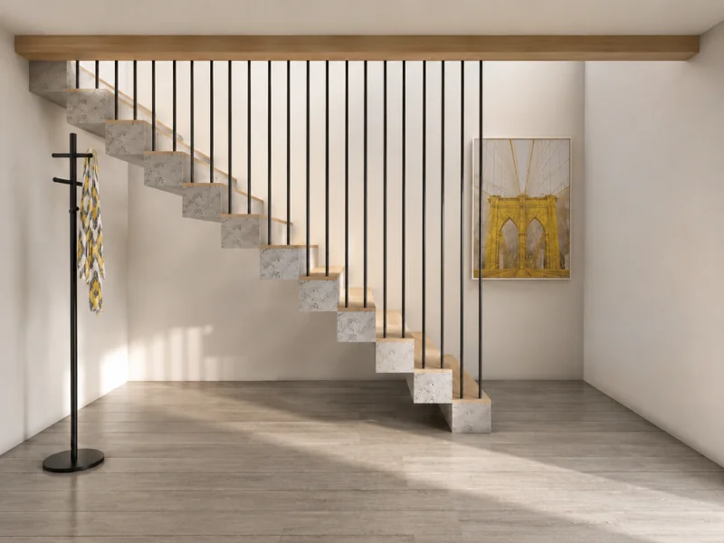 Concrete staircase with wood treads, black vertical rails, a wood ceiling beam, and framed wall art.