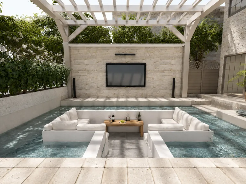 Sunken outdoor seating area surrounded by water beneath a white pergola, facing a wall-mounted TV.