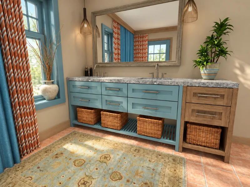 Colorful Southwestern bathroom with a blue double vanity, terracotta floor tile, woven baskets, and patterned curtains.