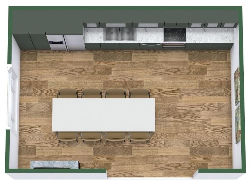 Top-down view of a one-wall kitchen with green cabinets, sink and cooktop along a single wall, and a long dining table with seating centered in the open space on wood flooring.