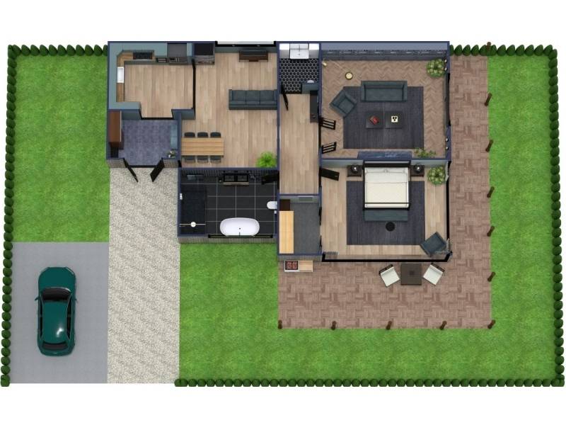 Top-down floor plan of a single-story home featuring a wraparound porch that extends along two sides of the house, with outdoor seating areas and direct access to the interior living spaces, surrounded by lawn and landscaping.