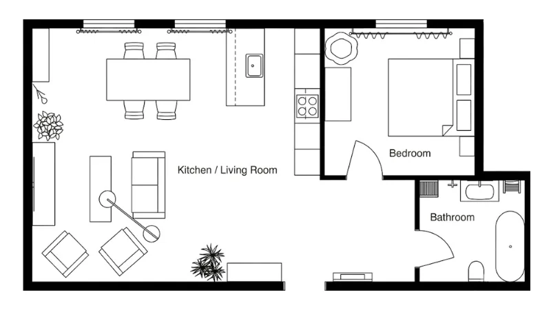 Black-and-white floor plan of a small apartment showing an open kitchen and living room on the left, a bedroom in the upper right, and a bathroom in the lower right. The layout includes furniture, windows, doors, kitchen counters, dining table, sofa, chairs, bed, bathtub, toilet, sink, and plants.