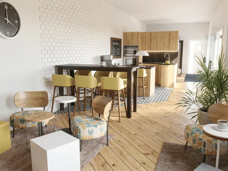 Bright office café with patterned lounge chairs, a high communal table with yellow stools, wood flooring, potted plants, and a compact wood-finished kitchen.