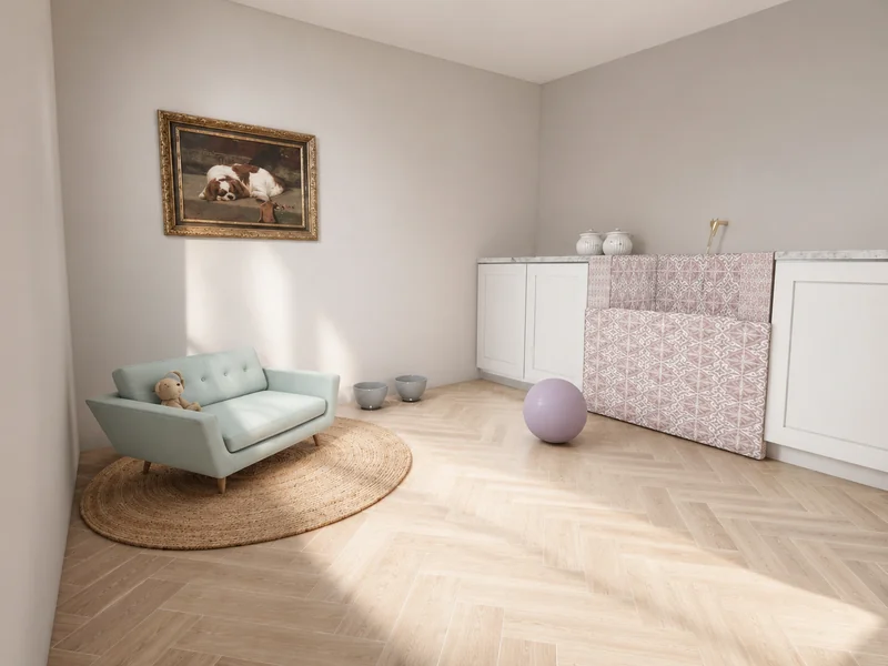 Children’s playroom with a small mint-green sofa and teddy bear, a round woven rug, a purple ball, storage cabinets, and a patterned play mat leaning against the wall.