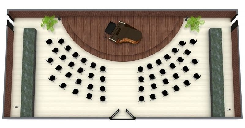 3D floor plan of a concert hall with a curved wooden stage featuring a grand piano. The seating is arranged in two fan-shaped sections facing the stage.