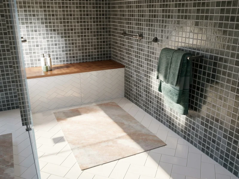 3D rendering of a roll-in shower with gray mosaic wall tiles, white herringbone floor tiles, a built-in wooden bench, wall-mounted controls, a towel rack with green towels, and a light-colored bath mat in the sunlit open shower area.