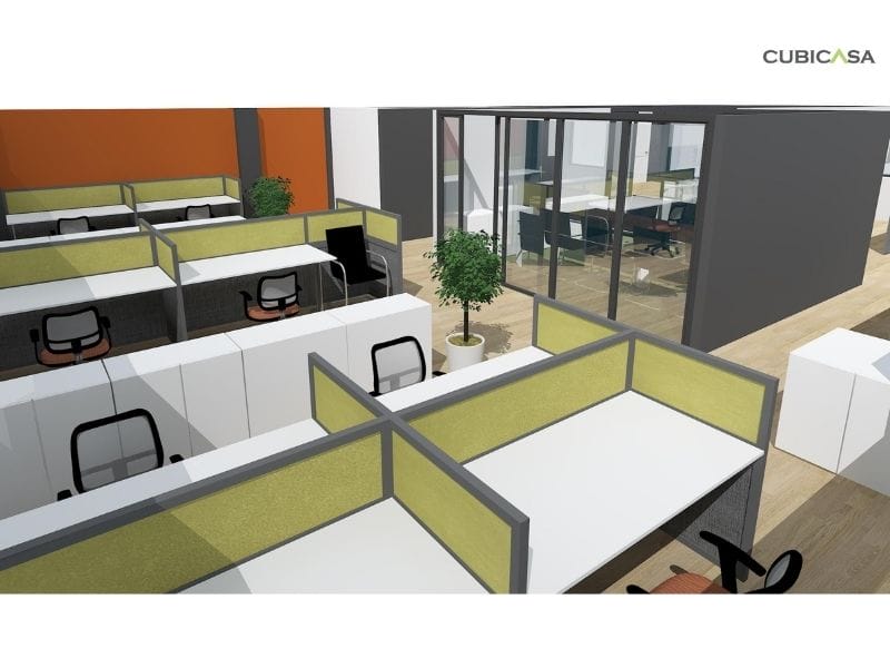 CubiCasa 3D commercial design with rows of modern cubicles featuring green dividers, ergonomic chairs, and potted plants. A glass-walled meeting room is visible in the background, creating a bright and collaborative workspace.