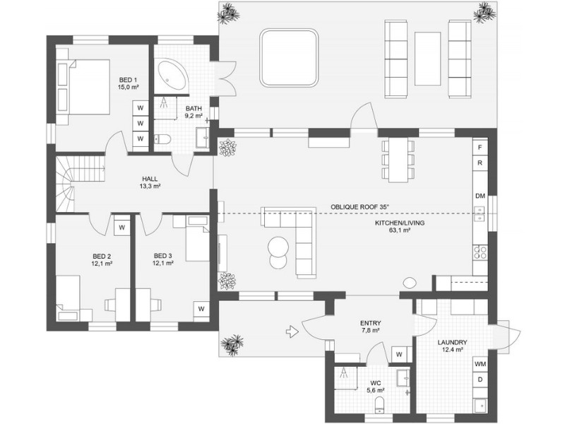Black-and-white floor plan of a five-bedroom home. The layout includes an open kitchen and living area, three bedrooms grouped together on the left side, two additional bedrooms, a shared bathroom, an entryway with a separate WC, and a large laundry room. A spacious outdoor patio sits off the main living area.