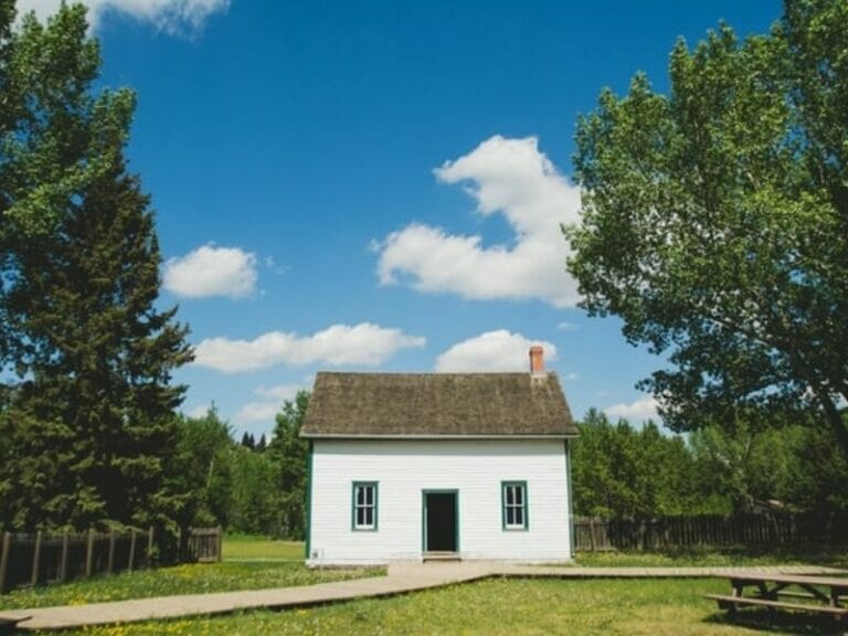 Tiny house white with lawn