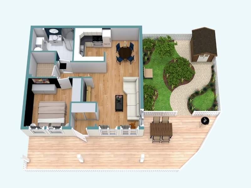 3D floor plan of a small home with bedroom, bathroom, kitchen, dining area, and living room, shown with wood flooring and furniture. The layout opens to a large outdoor deck with dining space and a landscaped garden with a shed and pathways.