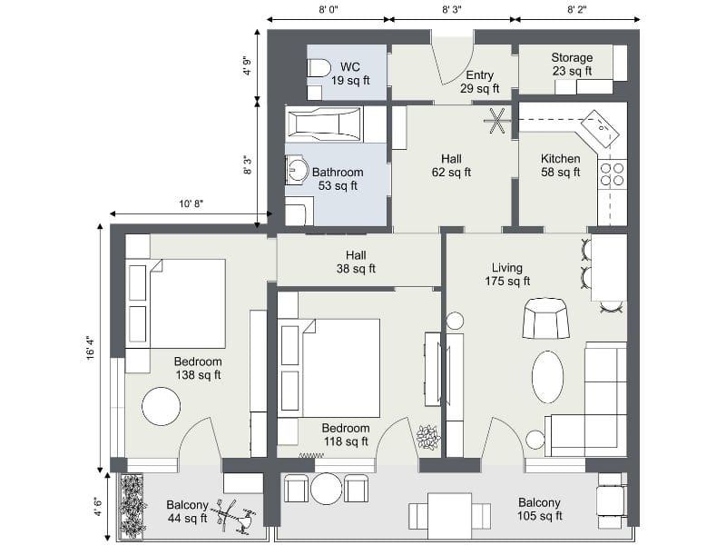 Two-bedroom apartment floor plan with two balconies, a full bathroom, and a separate guest WC. Layout also includes a kitchen, living room, storage, and entry hall.