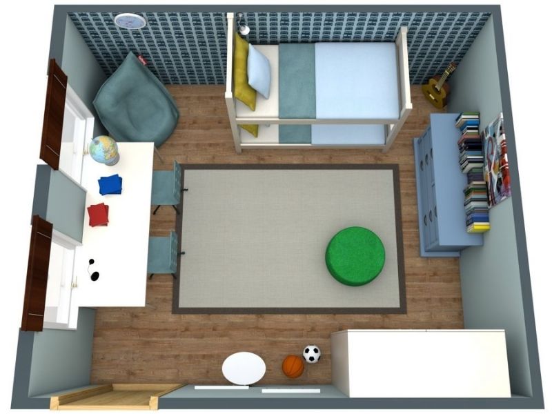 3D floor plan of a child’s bedroom with a single bed against the back wall, dressed in blue bedding and yellow pillows. A study desk with two chairs sits under the window on the left, while a bean bag chair is placed in the corner.