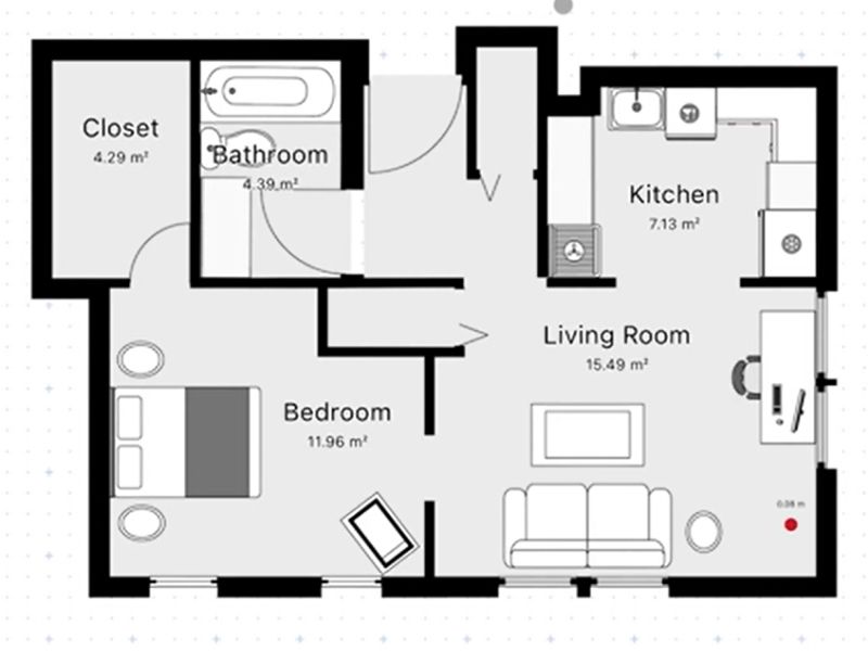 2D floor plan made with the magicplan software. The floor plan has one bedroom with a walk-in closet, a living room, a kitchen, and a bathroom. All rooms are furnished.