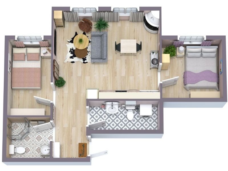 This two-bedroom, two-bathroom condo floor plan stands out with its feminine touches and contemporary charm. The entrance is flanked by two bathrooms, each featuring stunning tile floors that add instant style. Beyond the entryway, the open living room flows seamlessly into the dining area and kitchen. Light hardwood floors and a pair of windows create a bright, modern ambiance. The compact kitchen includes a one-wall countertop with a sink, stove, and refrigerator. Each bedroom is located on either side of the living room, with its own window and matching light hardwood flooring.