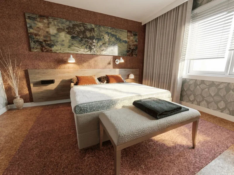 Accessible bedroom with generous clear floor space around the bed, easy-to-reach lighting, and an open layout for comfortable movement.