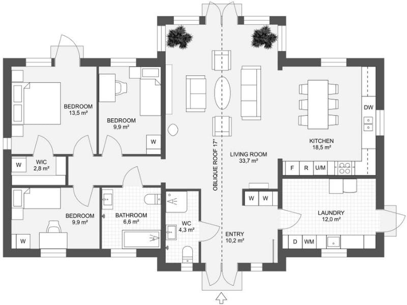2D black-and-white floor plan of a single-story house with a clearly labeled layout. The design includes four bedrooms, a central living room, a kitchen and dining area, and a laundry room. Additional spaces include a bathroom, a separate toilet (WC), walk-in closets (W), and an entry hall. The kitchen features standard appliances, and the laundry room includes designated washer and dryer areas. The layout is symmetrical with the main entrance leading directly into the central living space.
