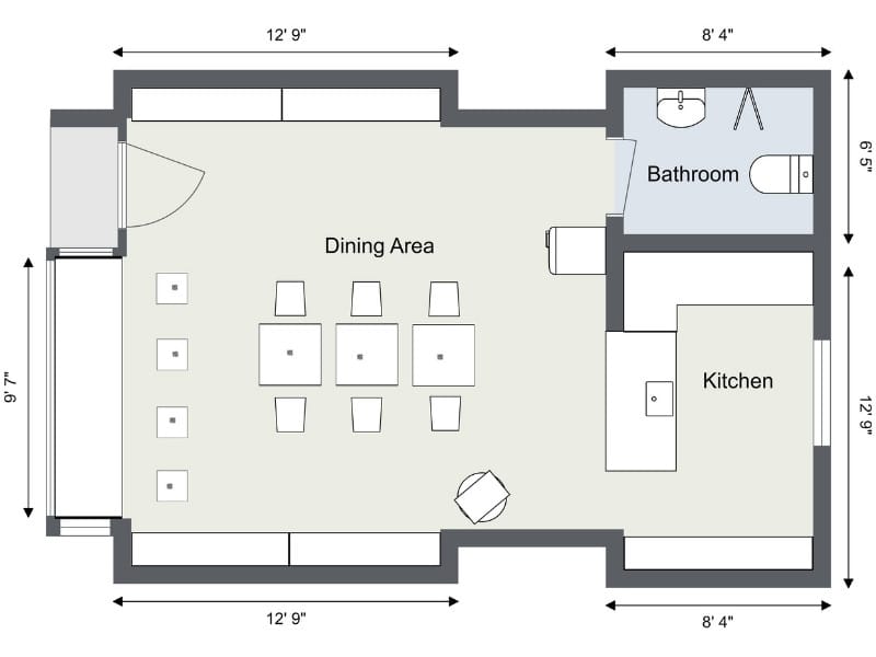 2D floor plan of a small coffee shop layout with a central dining area.