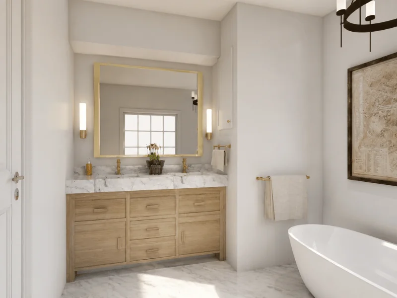 Bright craftsman-style bathroom with a light wood double vanity, marble countertop, brass accents, framed mirror, and modern freestanding tub.
