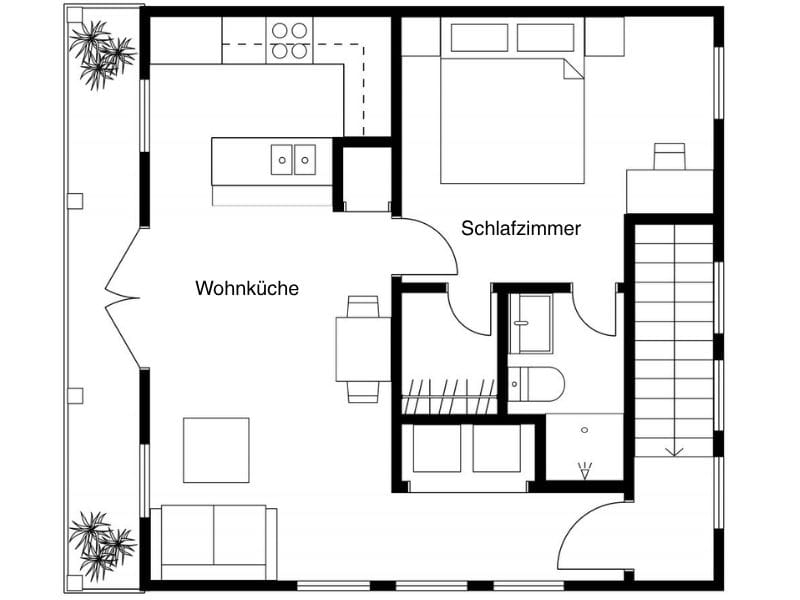 2D-Grundriss eines Hauses mit einem Schlafzimmer, einem Badezimmer und offener Küche.