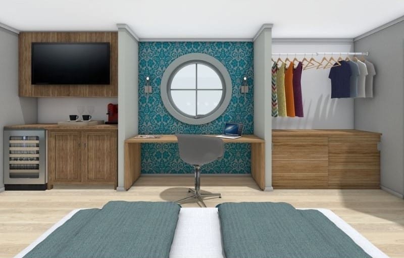 Hotelzimmer mit Arbeitsbereich, Miniküche und Stauraum, ideal für Geschäftsreisende