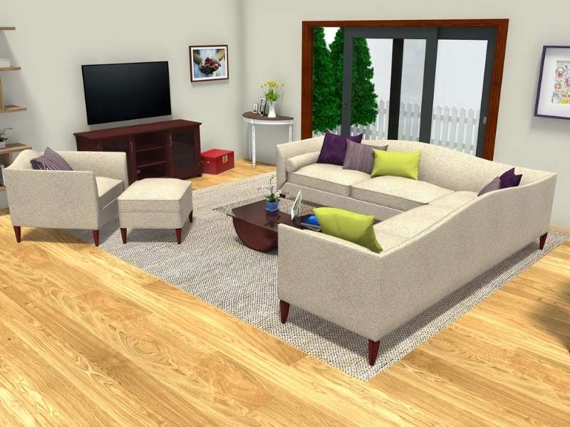 Ein mit RoomSketcher erstelltes 3D-Foto, das Sofas in unterschiedlichen Konfigurationen zusammen mit einem Couchtisch zeigt.